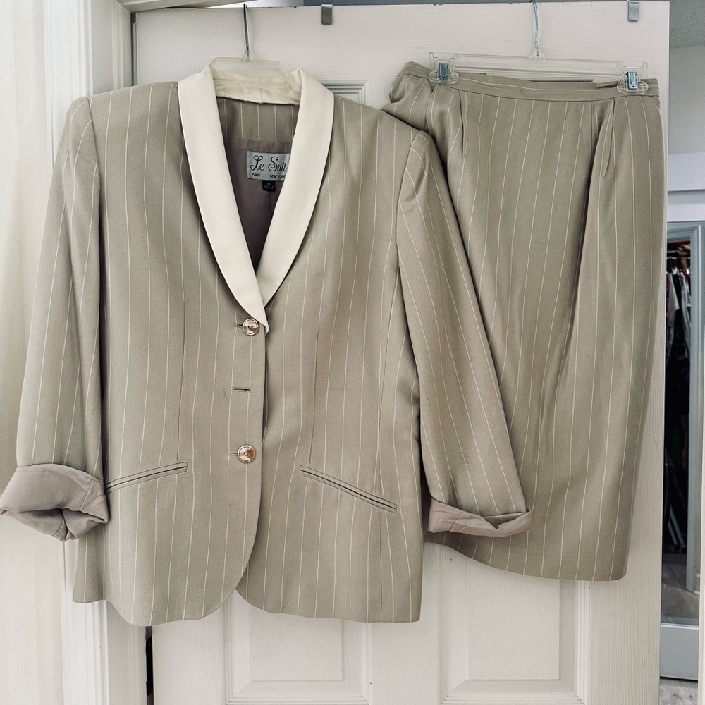Gently used Le Suit Size 14 tan pin stripe 3 Button and matching size 12 skirt.